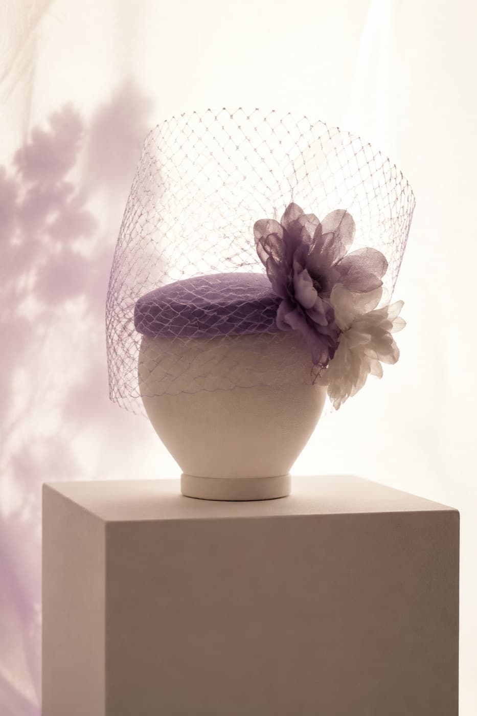 Veiled pillbox on a featureless display block