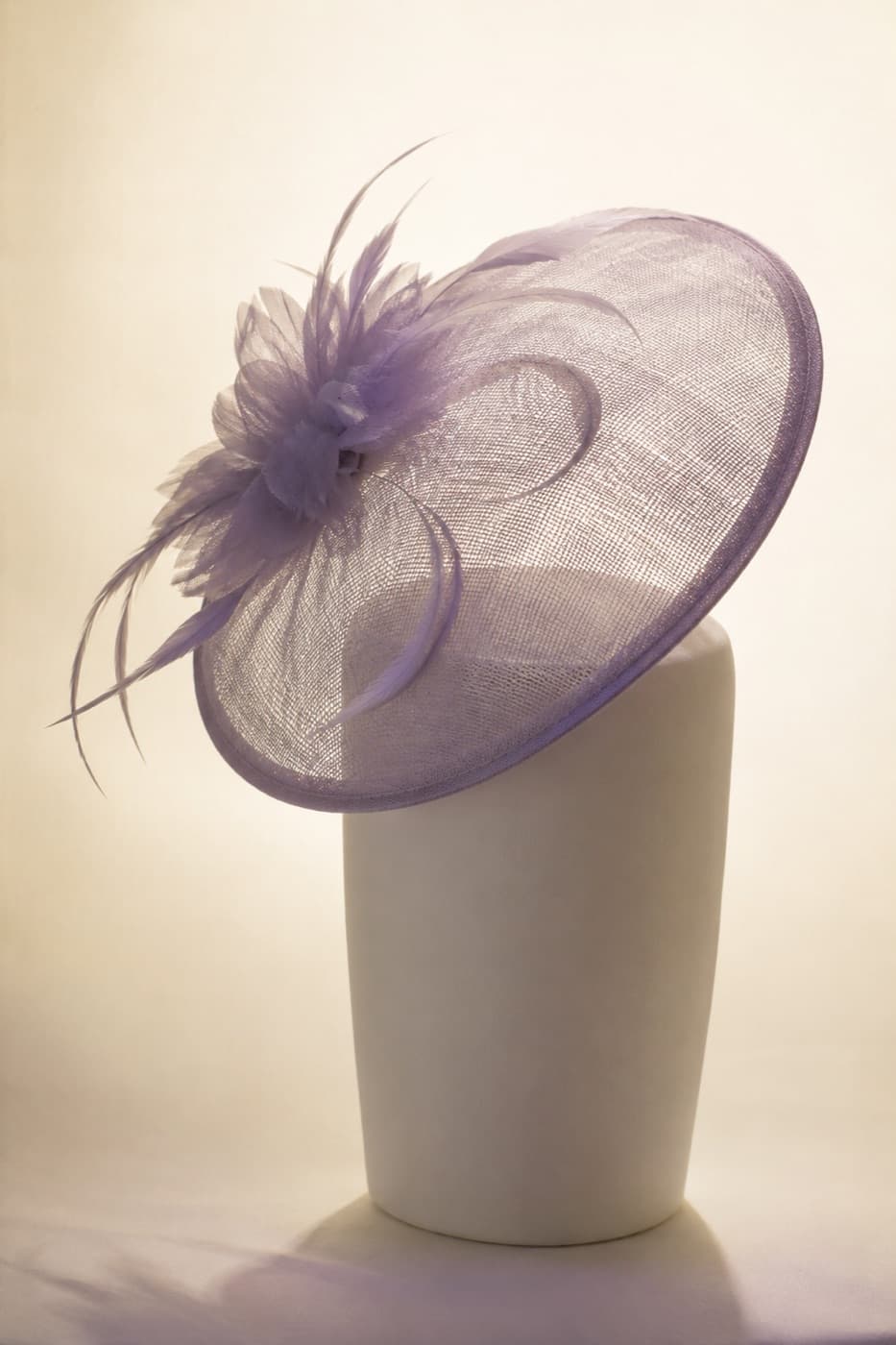 Fascinator Disc photographed whole against an ivory ground