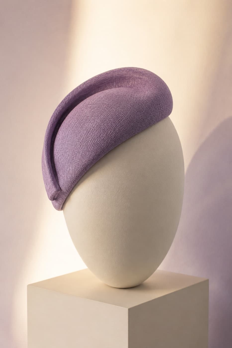 Fascinator Sculpted photographed whole against an ivory ground