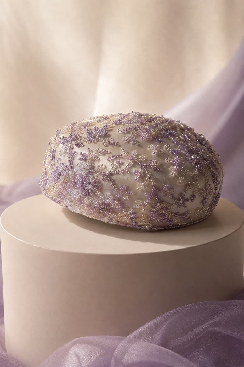 Pillbox Beaded photographed whole against an ivory ground