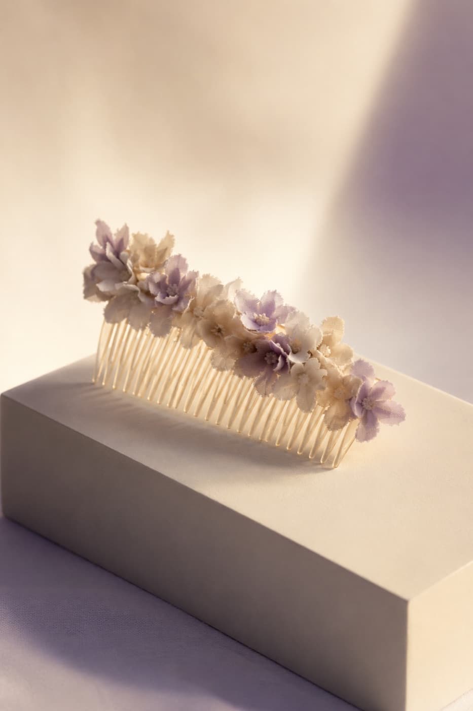Comb Floral photographed whole against an ivory ground