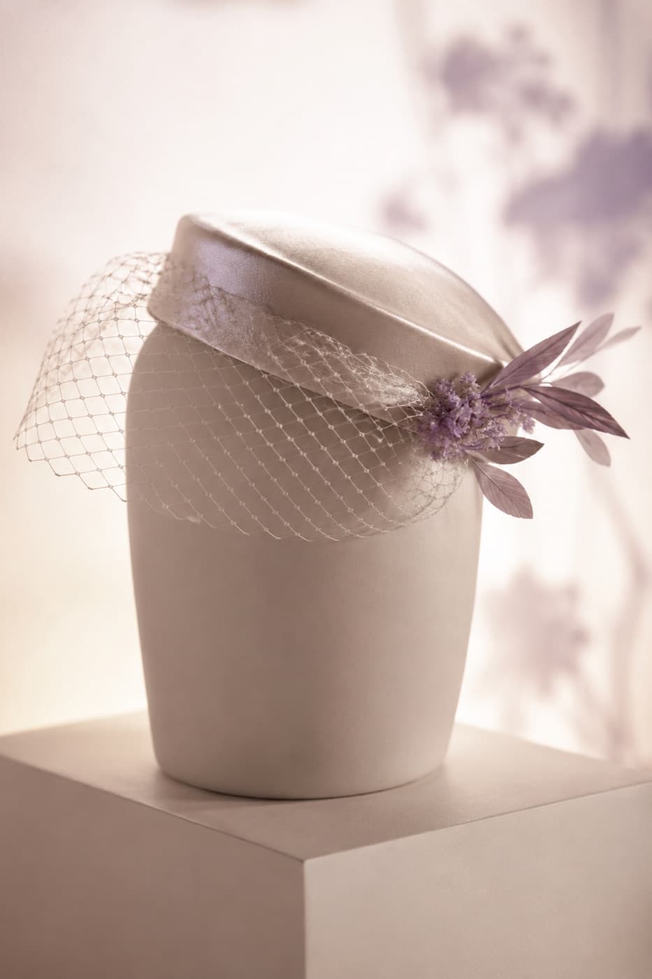 Pillbox Veiled photographed whole against an ivory ground