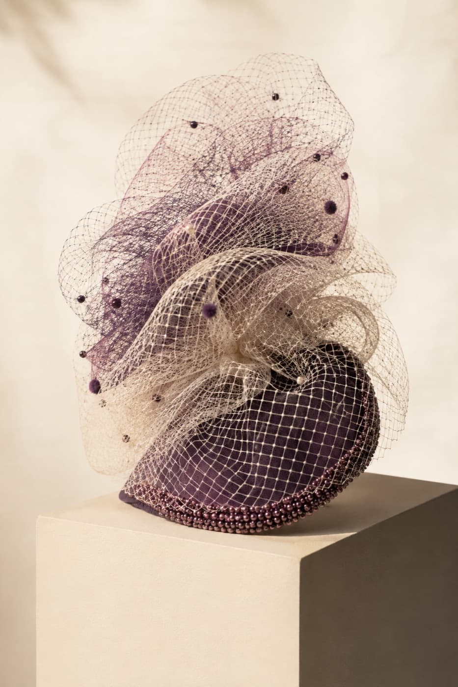 Veiled Couture photographed whole against an ivory ground